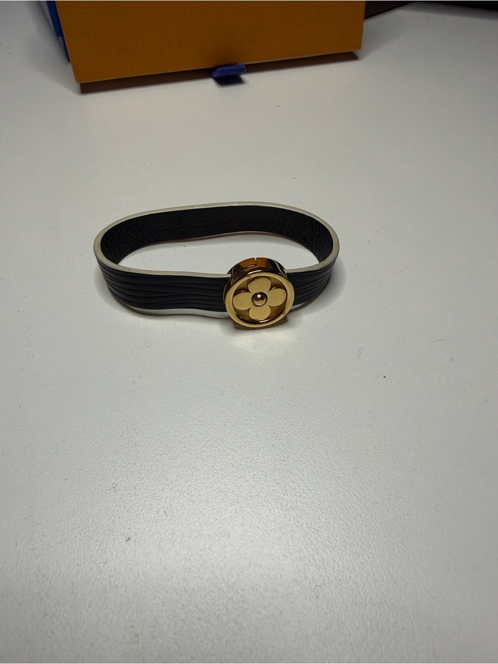 Louis Vuitton Black Leather Bracelet with Gold Flower Medallion